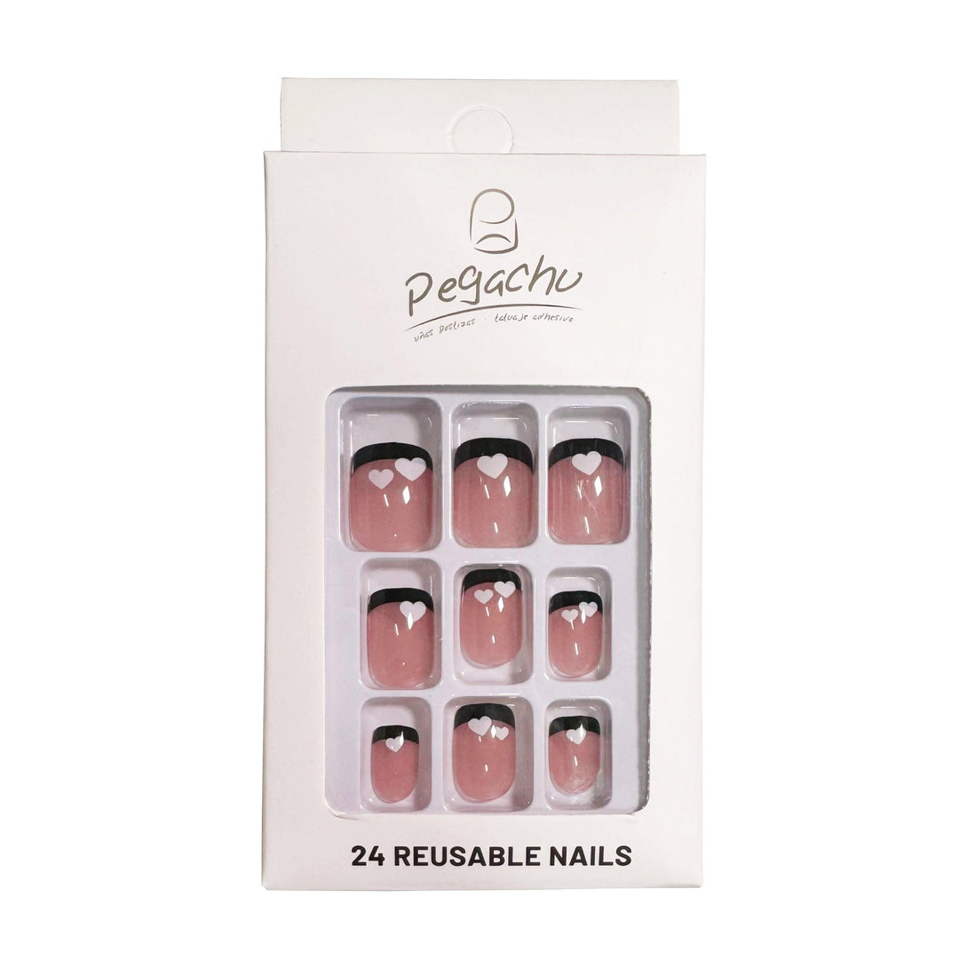 Pegachu uñas postizas 2024 verano modernas colores rosas nudes francesa con borde negro, corazones blancos